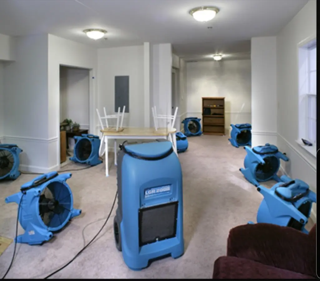 Air movers and dehumidifier setup for Water Damage Restoration in Homeland Park